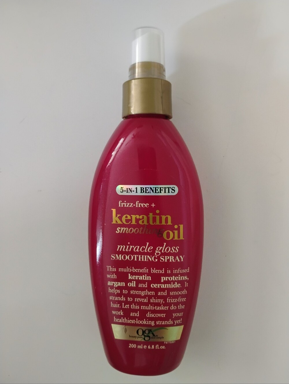 OGX Frizz-Free + Keratin Smoothing Oil Miracle Gloss Spray, 6.8 oz Discontinued